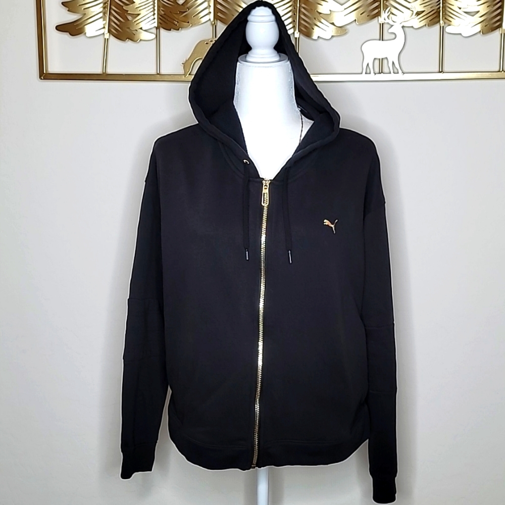 Woman's Puma Zip Up Hooded Sweatshirt